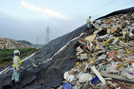 环境省称居民区的地震垃圾将于8月底前清理完