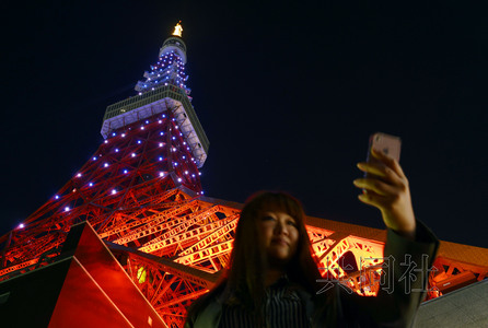 东京塔亮紫灯为“消除对女性的暴利运动”助威